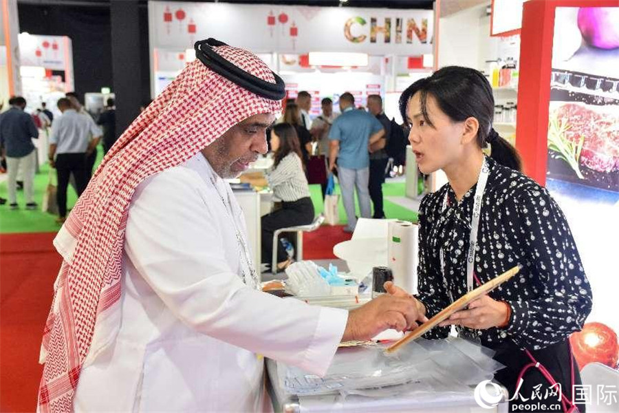 參展商交流。人民網(wǎng)塔里克·易卜拉欣攝