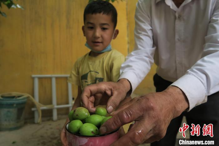 圖為進(jìn)藏先遣英雄連誓師地原址所在的新疆維吾爾自治區(qū)和田地區(qū)于田縣普魯村現(xiàn)貌?！畛坛?攝