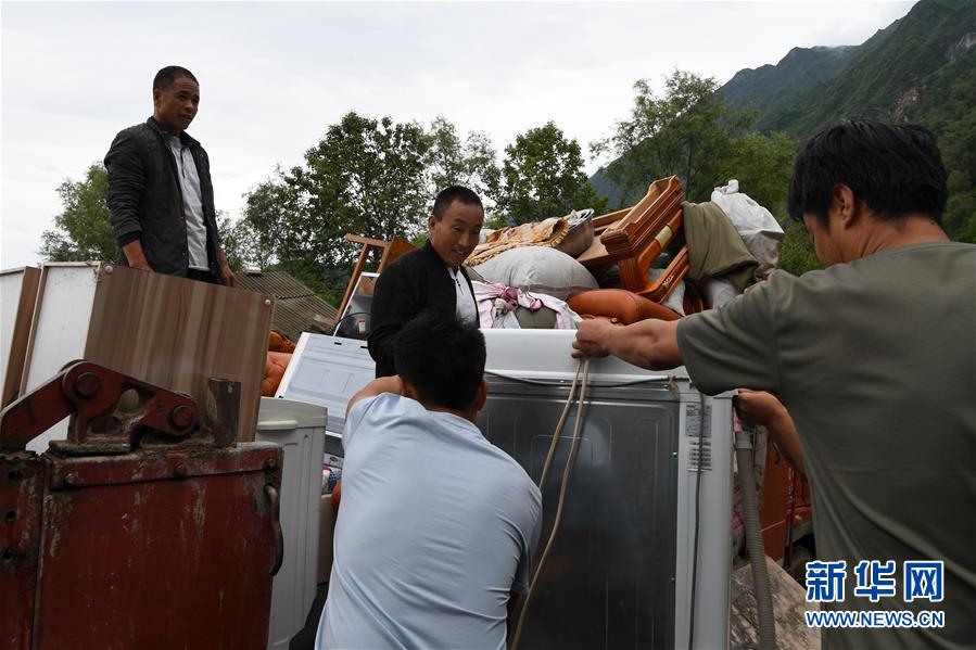 （新華全媒+）（9）千里“挪窩”，踏實(shí)開啟新生活