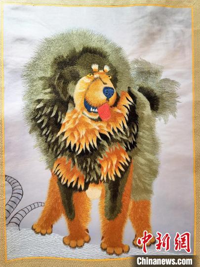 圖為藏繡作品?！∑钤鲚?攝