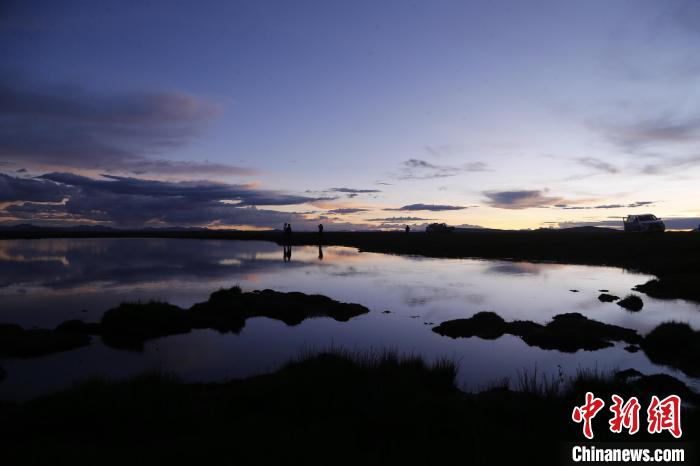 圖為夕陽下的查旦濕地?！●R銘言 攝