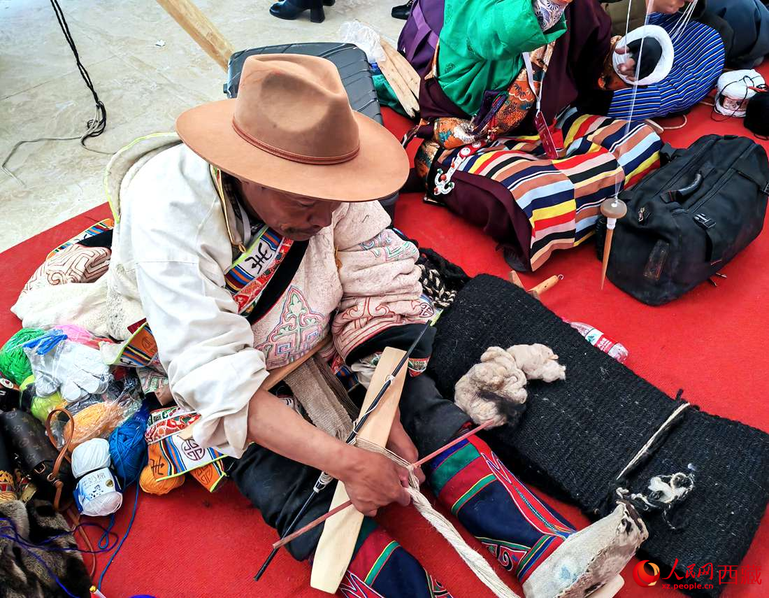 編織技能展示。人民網(wǎng) 李海霞攝