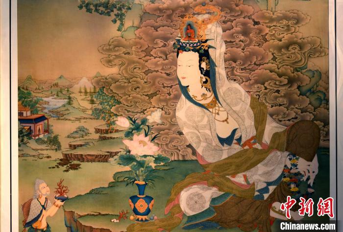 圖為5月16日，展覽中新創(chuàng)唐卡作品《靜息觀音》(局部)。　李林 攝